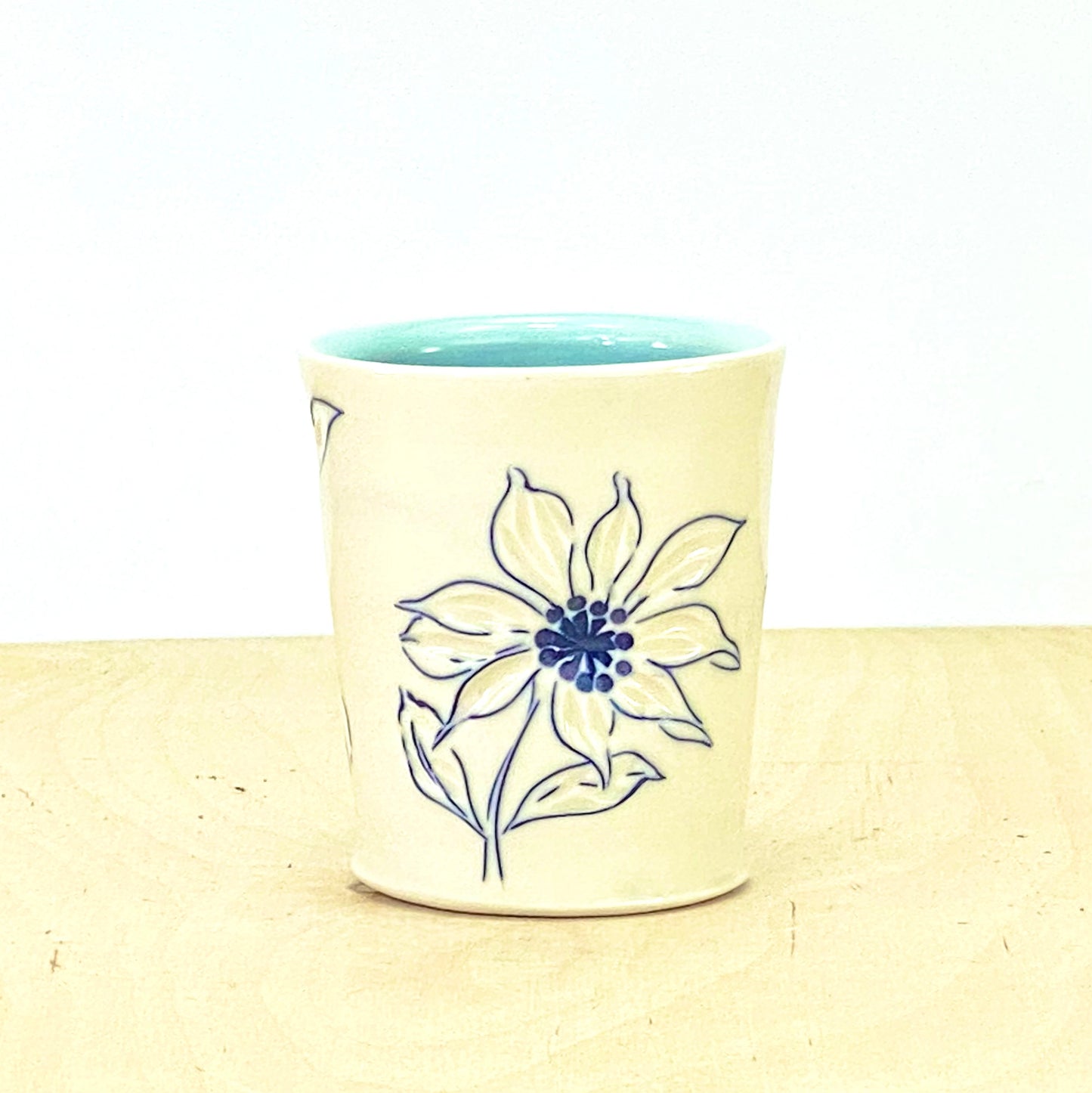 Cup with sunflower