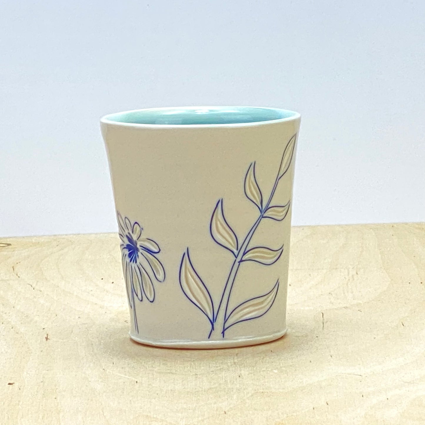 Cup with flowers